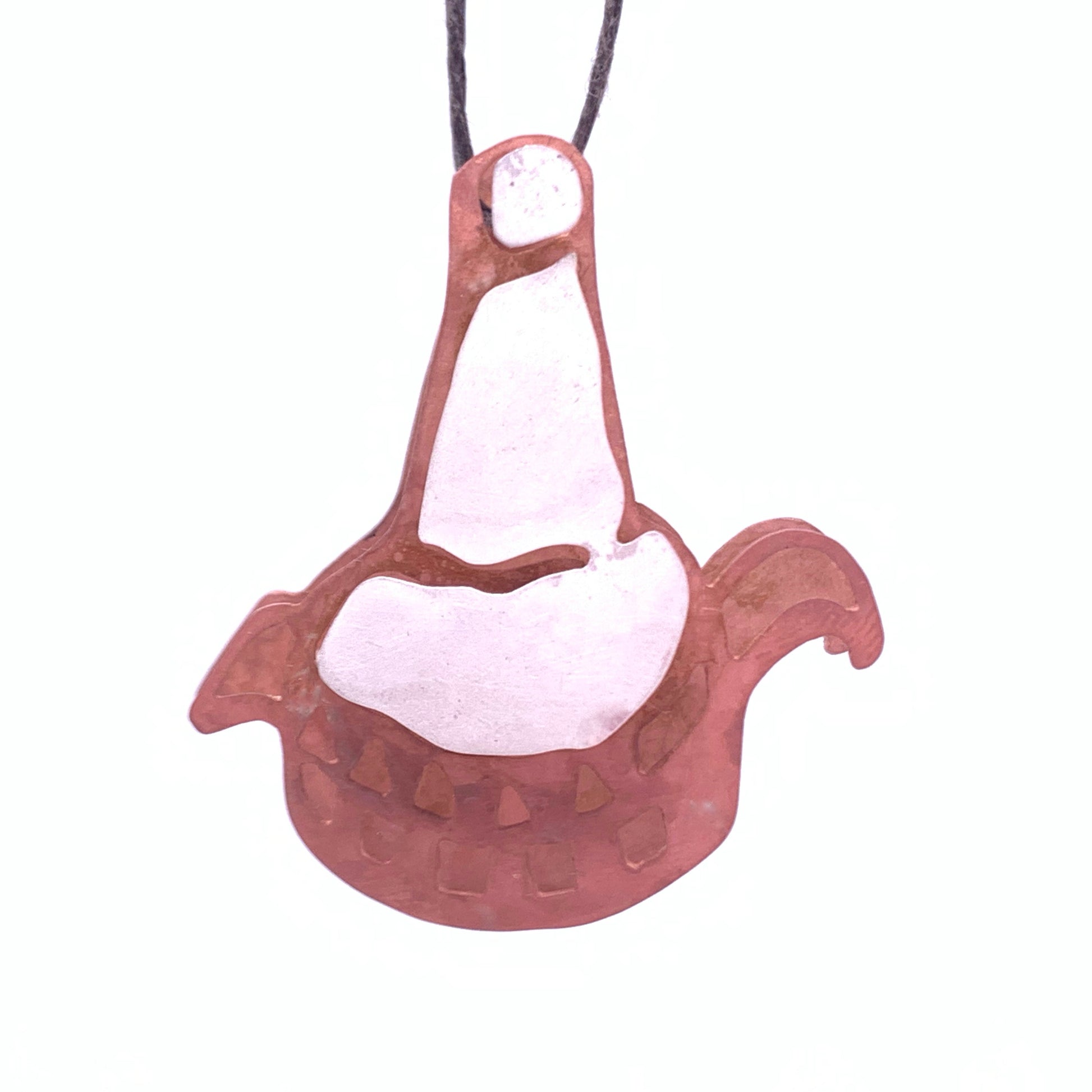 Handmade art jewelry pendant shaped like a hotpot, crafted in reddish copper tones with a white enamel center, symbolizing warmth, family gatherings, and hometown memories.