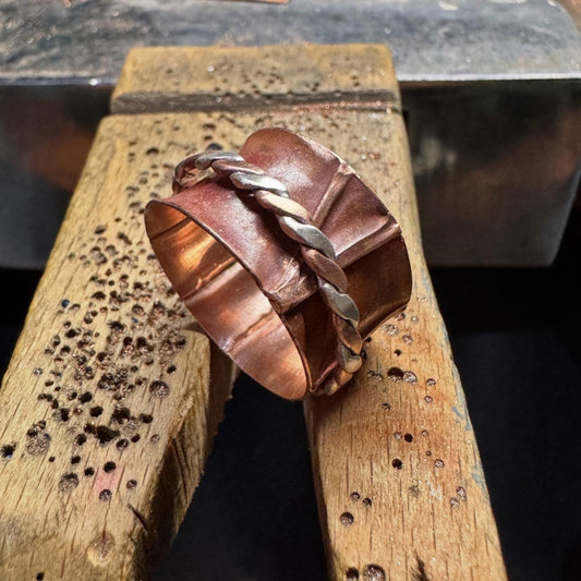 Copper Fold Forming Band with silver accents spinner on a bench pin__MorphiArtForge_Fidget