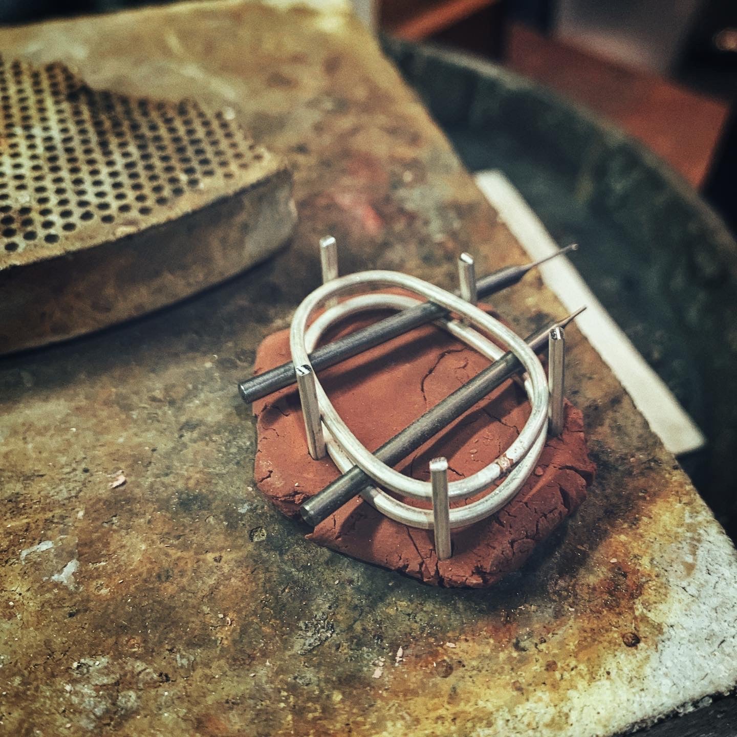 Work in progress,Handcrafted silver necklace pendant by MorphiArtForge, featuring a beach pebble from Beach Bounty Creations.