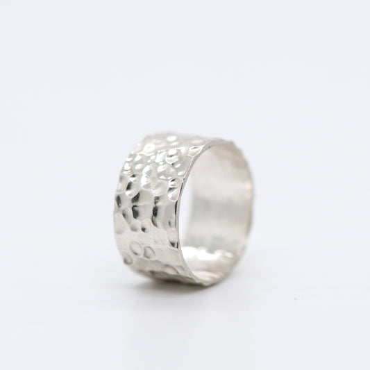 Fine silver band ring with a richly hammered, matte surface on a white background_MorphiArtForge_Handcrafted Jewelry