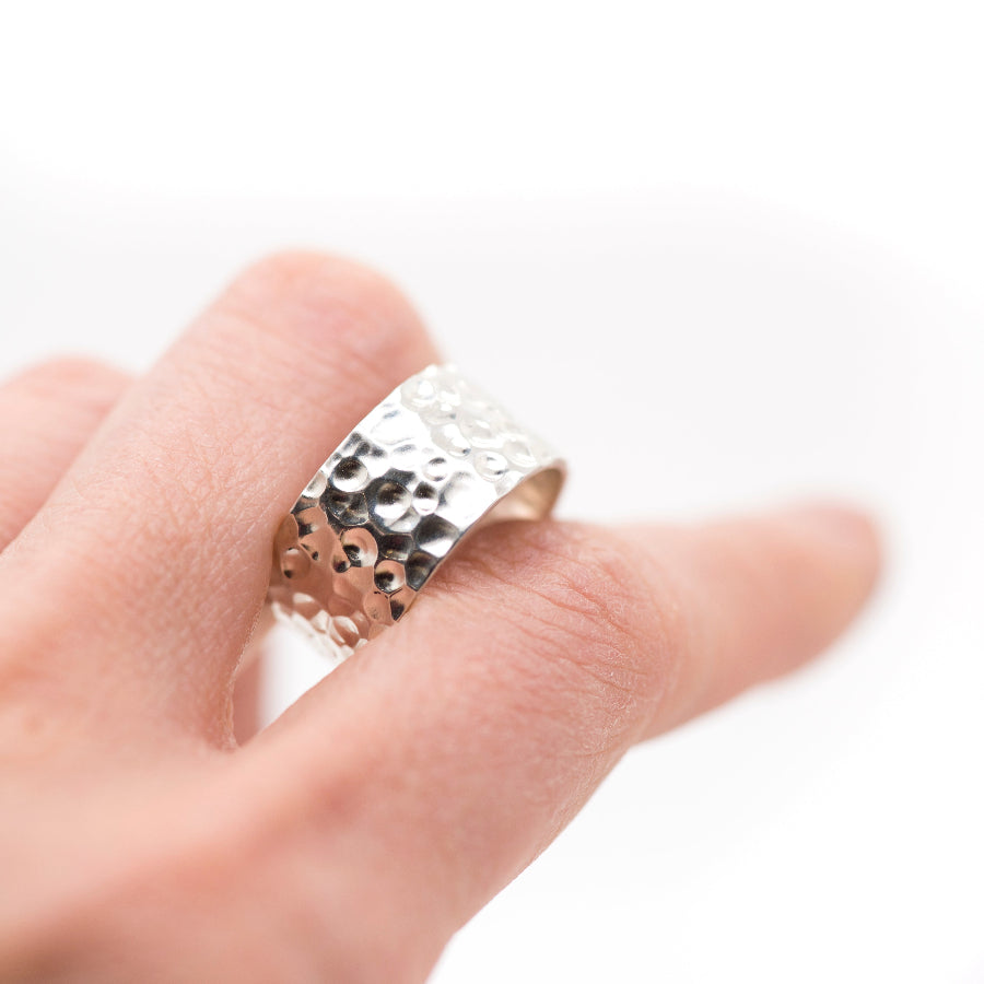 Fine silver band ring with a richly hammered, matte surface on a white background_MorphiArtForge_Handcrafted Jewelry