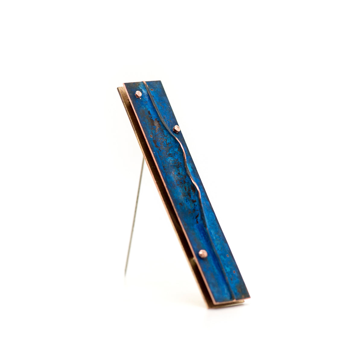 Blue patina fold-formed copper brooch with sculptural metal details
