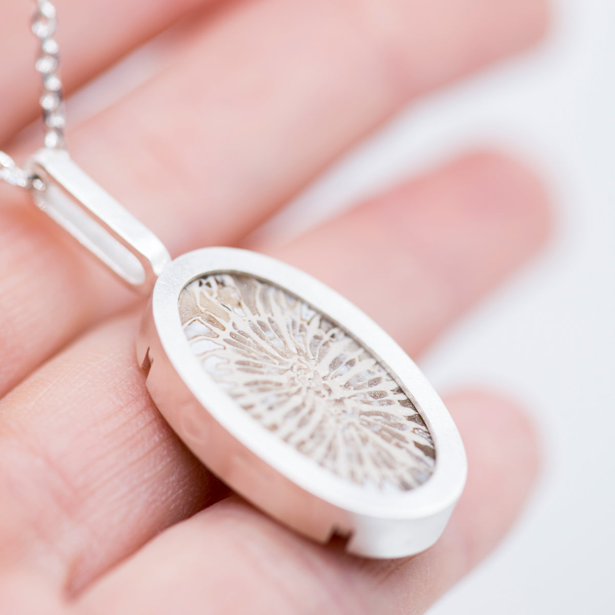 Grayscale Elegance: Fossil Silver Necklace - MorphiArtForge