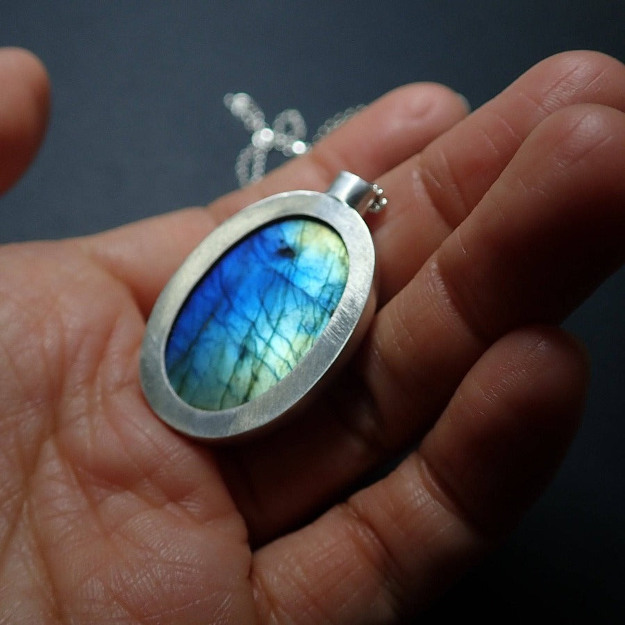 Ocean in the Bottle: Labradorite oval pendant - MorphiArtForge